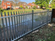 Steel Palisade Fence and Gate Overlooking Worsley Canal